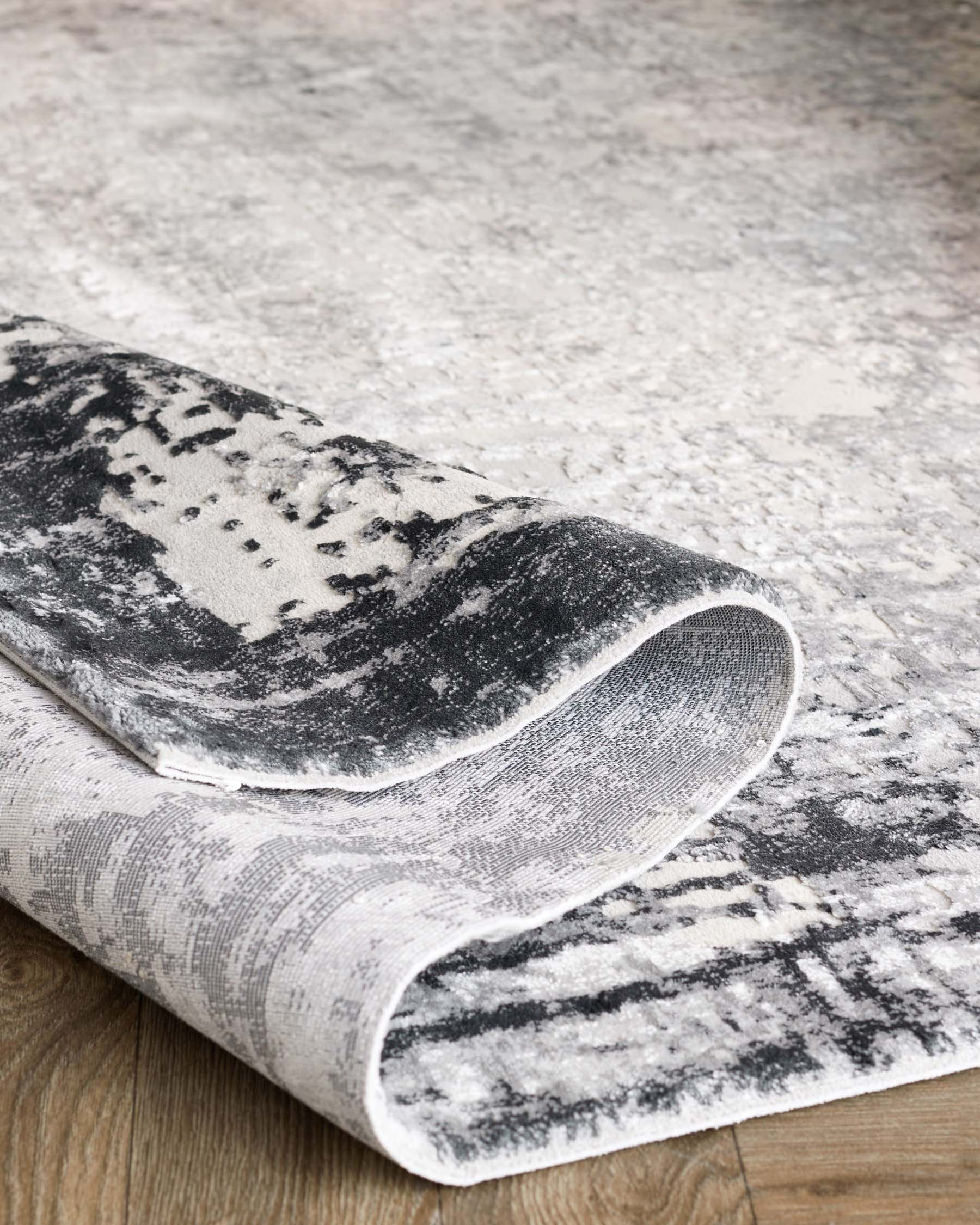 Distressed dark grey textured large rug - Image 4
