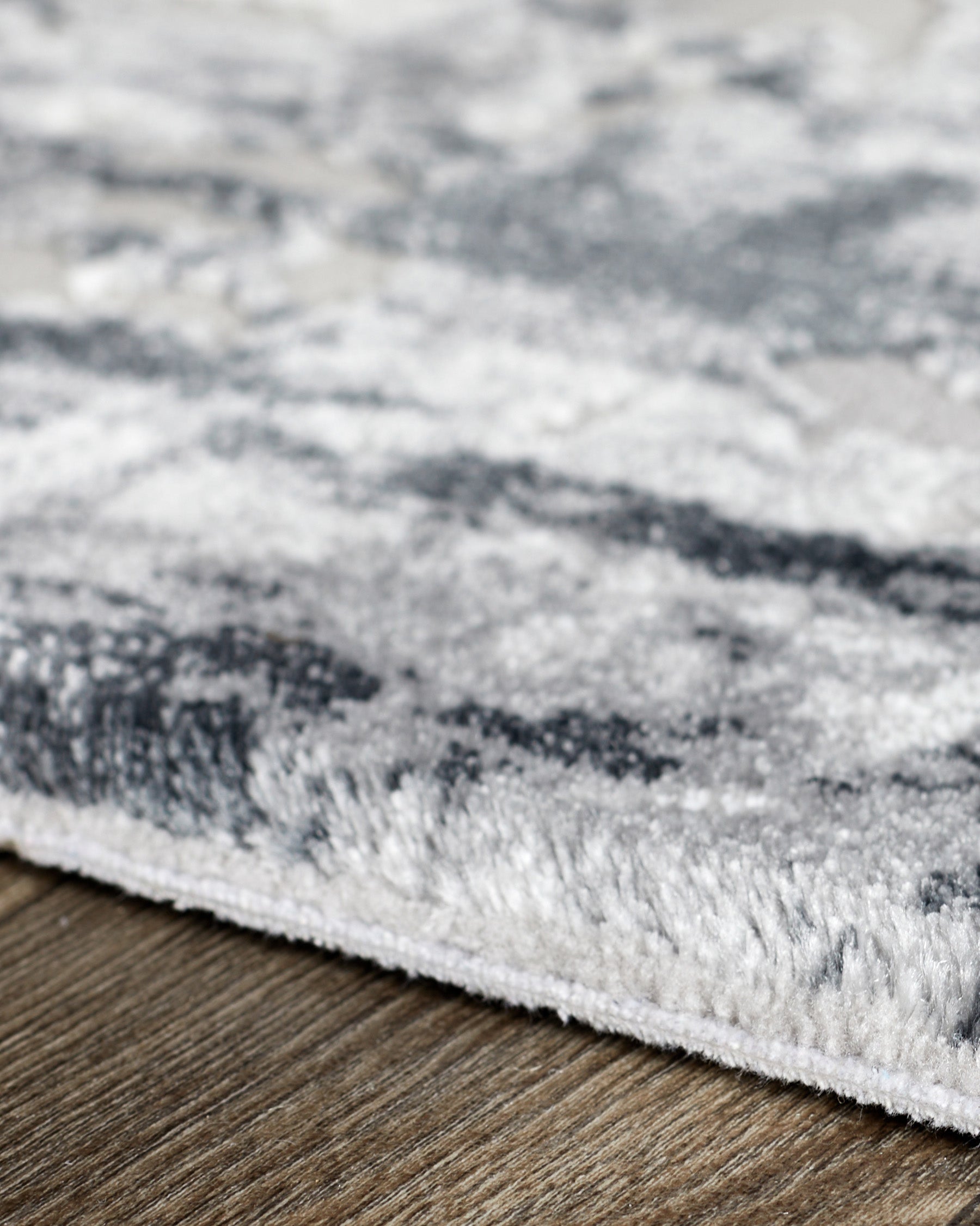 Distressed dark grey textured large rug - Image 5